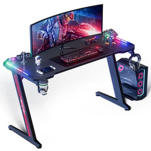Charger l'image dans la galerie, WeValley Bureau Gaming LED, 140 x 60cm Grande Bureau Gamer avec Un Plateau en Fibre de Carbone, Noir