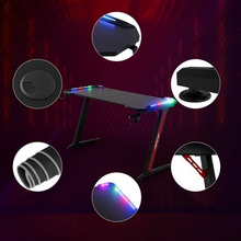 Charger l'image dans la galerie, WeValley Bureau Gaming LED, 140 x 60cm Grande Bureau Gamer avec Un Plateau en Fibre de Carbone, Noir